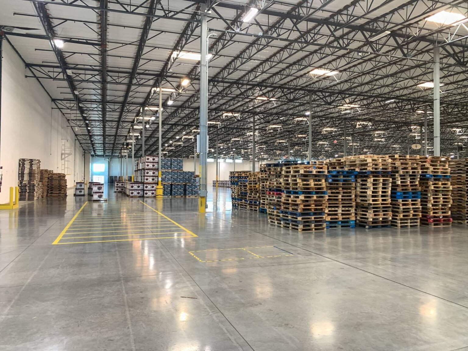 Massive empty industrial warehouse interior with s 2024 09 11 21 25 18 utc (1)